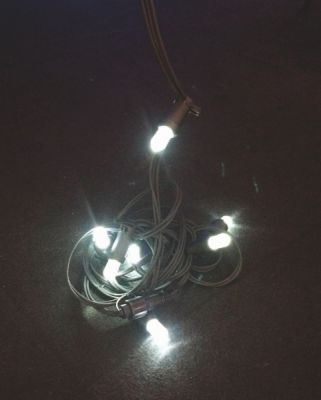 CATENA 20 LAMPADE LED Ø18 MM con luce BIANCO FREDDO con Cavo Nero Gommato - Ideali per uso esterno ed Interno